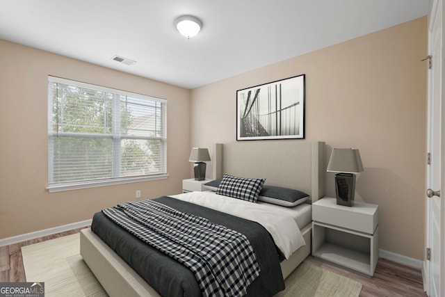 111 Moonlight Trl, Port Wentworth, GA 31407 - bedroom featuring baseboards and wood finished floors