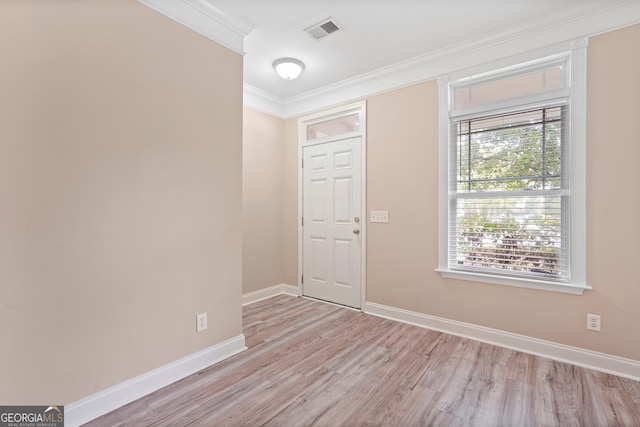 111 Moonlight Trl, Port Wentworth, GA 31407 - spare room featuring light wood-type flooring, crown molding, and baseboards