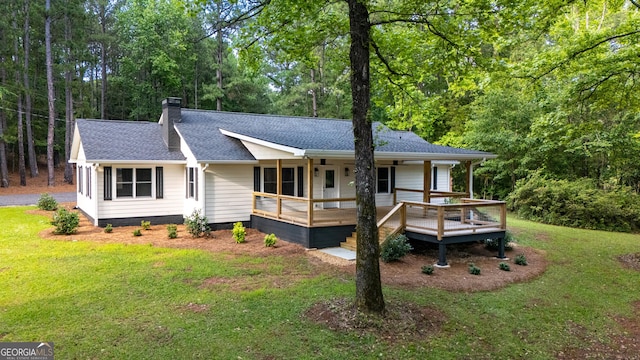 2265 Mobley Bridge Rd, Hogansville, GA 30230 - view of front of house featuring a front yard, a chimney, a shingled roof, and a porch