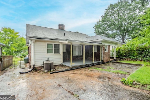 1615 Stokes Ave SW, Atlanta, GA 30310 - back of house with a chimney and brick siding