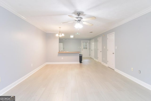 105 Westchester Dr Unit C4, Athens, GA 30606 - spare room with ceiling fan, ornamental molding, baseboards, light wood-type flooring, and a chandelier