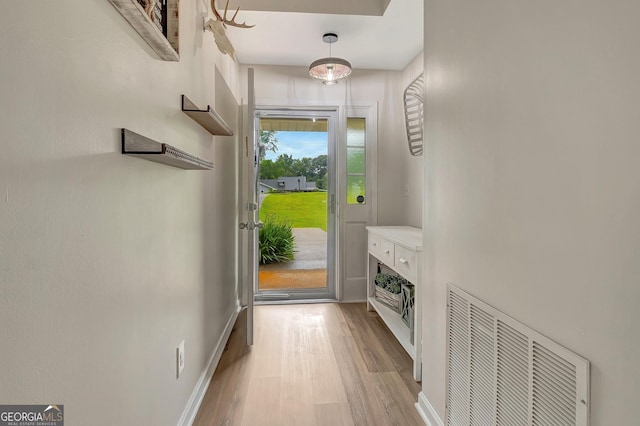 10 1st Ave E, Newnan, GA 30265 - entryway featuring light wood finished floors and baseboards