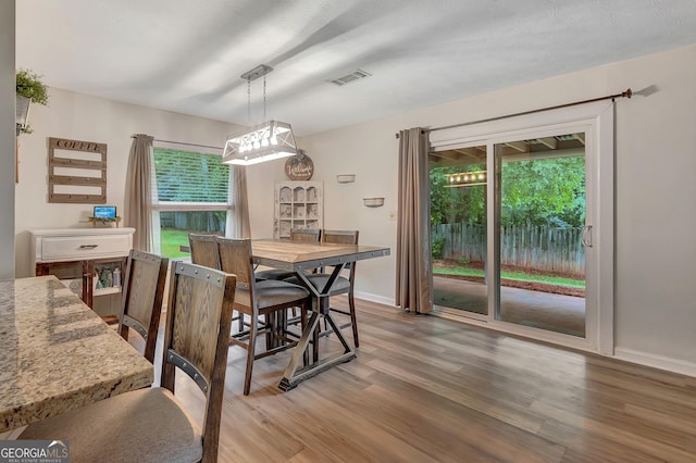 10 1st Ave E, Newnan, GA 30265 - dining room featuring wood finished floors and baseboards