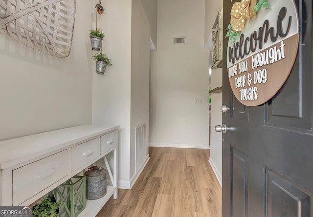 10 1st Ave E, Newnan, GA 30265 - entryway with baseboards and light wood-style flooring