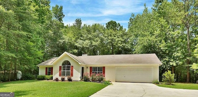 40 Moore Rd, Newnan, GA 30263 - single story home with an attached garage, concrete driveway, and a front lawn