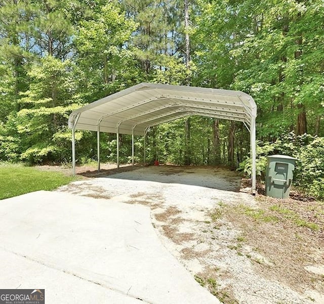 40 Moore Rd, Newnan, GA 30263 - view of parking with driveway and a detached carport