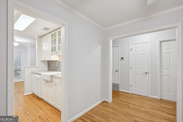 209 14th St NE Unit 109, Atlanta, GA 30309 - hall with light wood-style flooring and ornamental molding