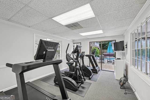 209 14th St NE Unit 109, Atlanta, GA 30309 - workout room featuring a paneled ceiling and baseboards