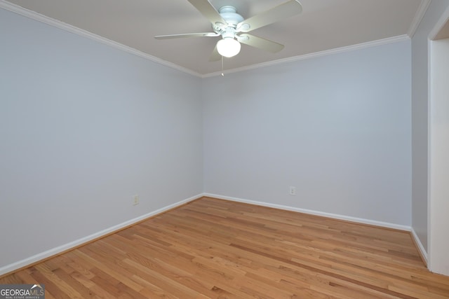 209 14th St NE Unit 109, Atlanta, GA 30309 - spare room featuring light wood-type flooring, a ceiling fan, and ornamental molding