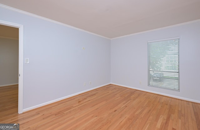 209 14th St NE Unit 109, Atlanta, GA 30309 - unfurnished room featuring light wood-style flooring and crown molding
