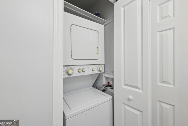 209 14th St NE Unit 109, Atlanta, GA 30309 - washroom featuring stacked washer and clothes dryer