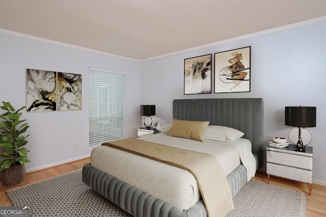 209 14th St NE Unit 109, Atlanta, GA 30309 - bedroom with crown molding and wood finished floors