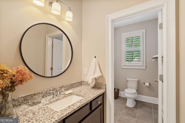 4224 Dogwood Bend Park, Berkeley Lake, GA 30096 - bathroom with vanity, tile patterned floors, toilet, and baseboards