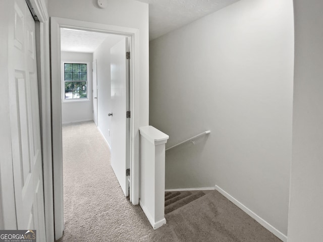 688 Anderson Walk, Marietta, GA 30062 - hall with carpet, an upstairs landing, and baseboards
