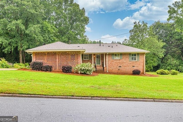 8140 Wood St SE, Covington, GA 30014 - ranch-style house with a front yard and brick siding