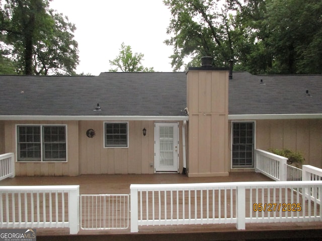 5848 Navarre Ct, Stone Mountain, GA 30087 - rear view of property featuring a chimney
