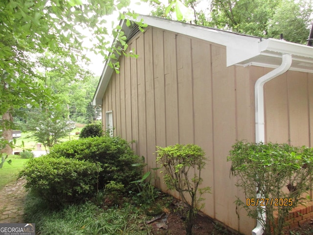 5848 Navarre Ct, Stone Mountain, GA 30087 - view of home's exterior with board and batten siding