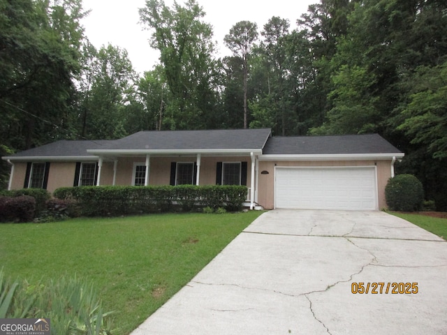 5848 Navarre Ct, Stone Mountain, GA 30087 - single story home featuring a front yard, an attached garage, and driveway