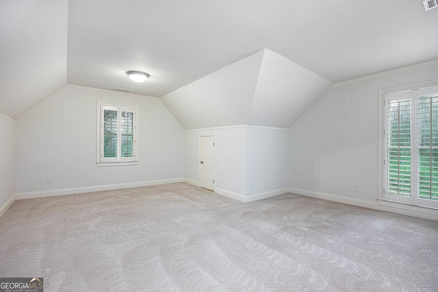 386 Link Rd, Alpharetta, GA 30022 - bonus room featuring light carpet, healthy amount of natural light, baseboards, and lofted ceiling