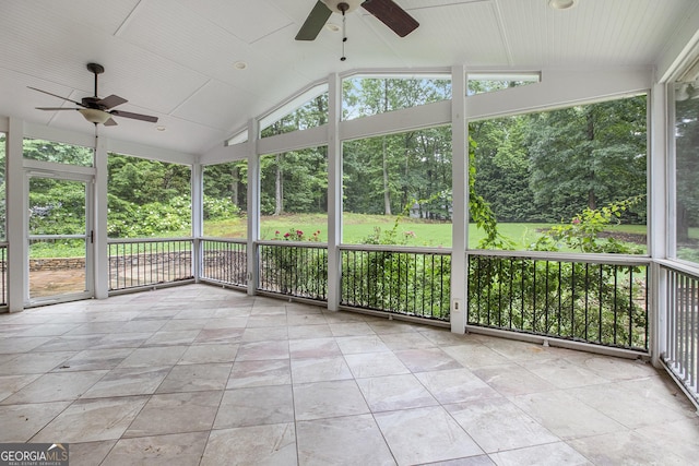 386 Link Rd, Alpharetta, GA 30022 - unfurnished sunroom with a ceiling fan, lofted ceiling, and view of wooded area
