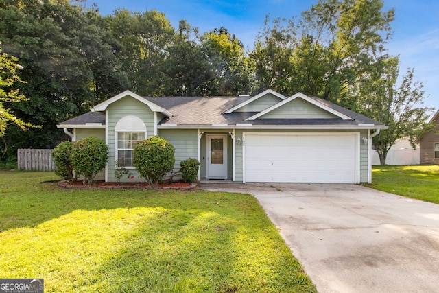 102 Shortleaf Ct, Kingsland, GA 31548 - ranch-style home featuring an attached garage, driveway, and a shingled roof