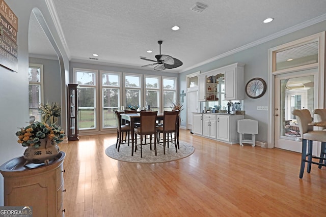 12 Par Dr, Jesup, GA 31546 - dining room with ornamental molding, a ceiling fan, recessed lighting, a textured ceiling, and light wood-style flooring