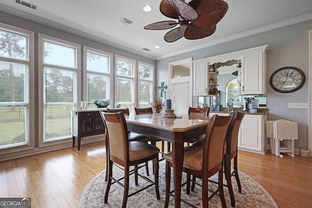 12 Par Dr, Jesup, GA 31546 - dining room with crown molding, light wood-style floors, a ceiling fan, and recessed lighting