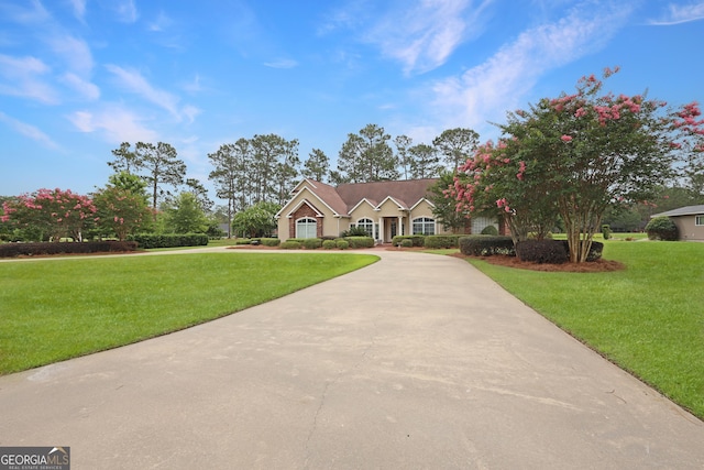 12 Par Dr, Jesup, GA 31546 - view of front of house with curved driveway and a front yard