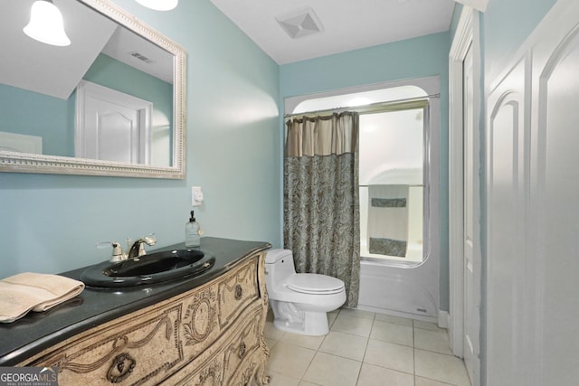 12 Par Dr, Jesup, GA 31546 - bathroom featuring vanity, toilet, tile patterned flooring, and shower / bath combo with shower curtain