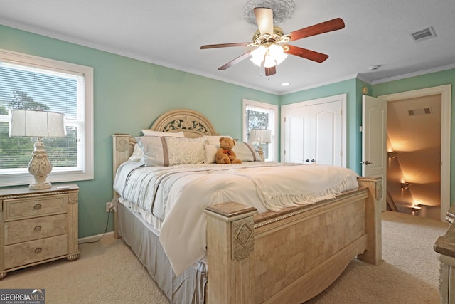 12 Par Dr, Jesup, GA 31546 - bedroom featuring light colored carpet, crown molding, a closet, and a ceiling fan