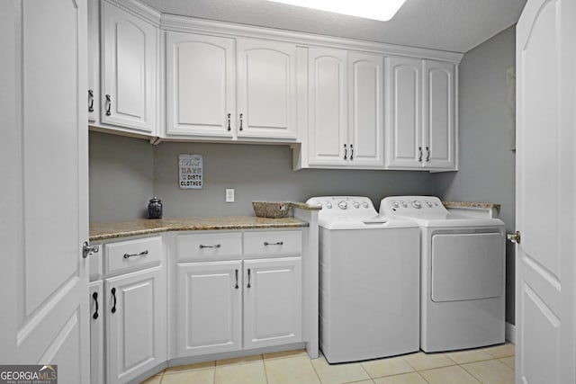 12 Par Dr, Jesup, GA 31546 - laundry area with cabinet space, washing machine and dryer, and light tile patterned floors