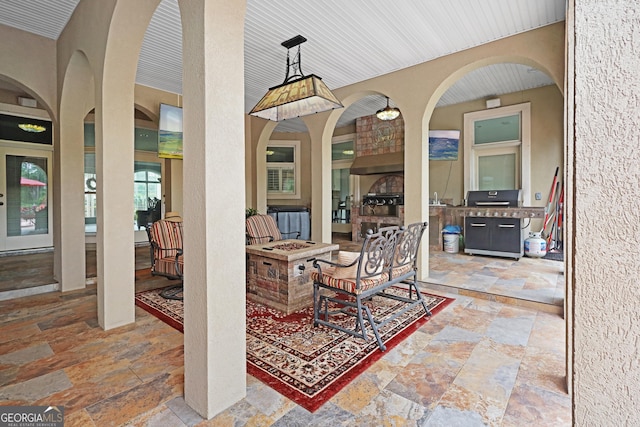 12 Par Dr, Jesup, GA 31546 - view of patio with an outdoor fire pit and a grill