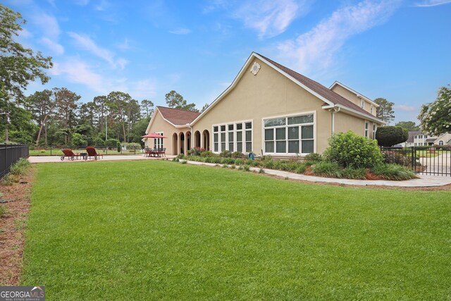 12 Par Dr, Jesup, GA 31546 - back of house with stucco siding