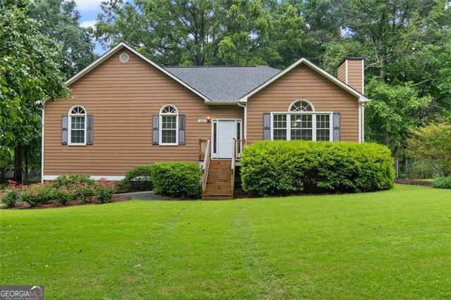 48 Saddle Field Cir, Cartersville, GA 30121 - view of front of home with a front yard and a chimney