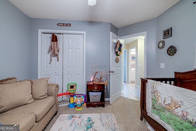 79 Churchill Ct, Richmond Hill, GA 31324 - bedroom with a closet, light colored carpet, and a textured ceiling