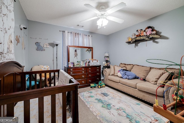 79 Churchill Ct, Richmond Hill, GA 31324 - carpeted bedroom featuring a textured ceiling and ceiling fan