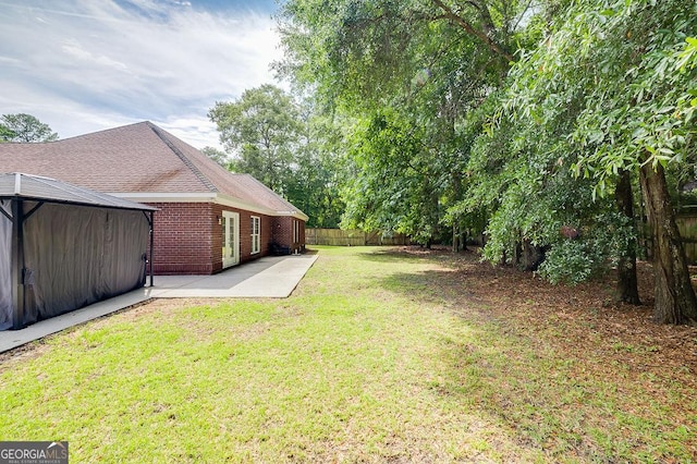 79 Churchill Ct, Richmond Hill, GA 31324 - view of yard featuring a patio and a gazebo