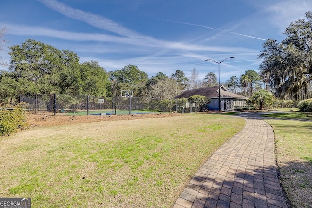 79 Churchill Ct, Richmond Hill, GA 31324 - view of yard with community basketball court