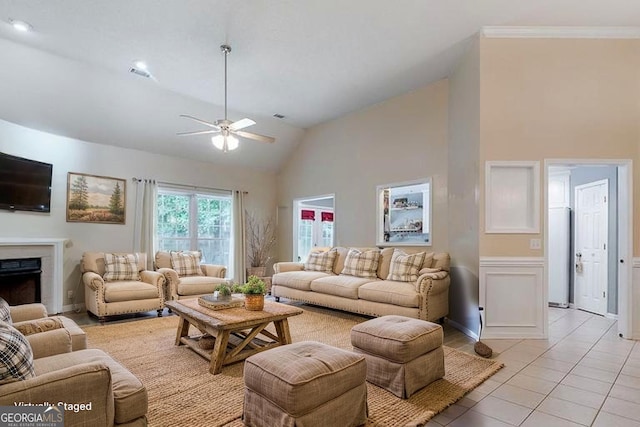 79 Churchill Ct, Richmond Hill, GA 31324 - living area featuring a ceiling fan, high vaulted ceiling, light tile patterned floors, a fireplace, and crown molding
