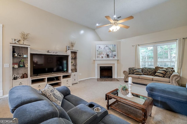 79 Churchill Ct, Richmond Hill, GA 31324 - living area featuring carpet flooring, lofted ceiling, a ceiling fan, and a tile fireplace