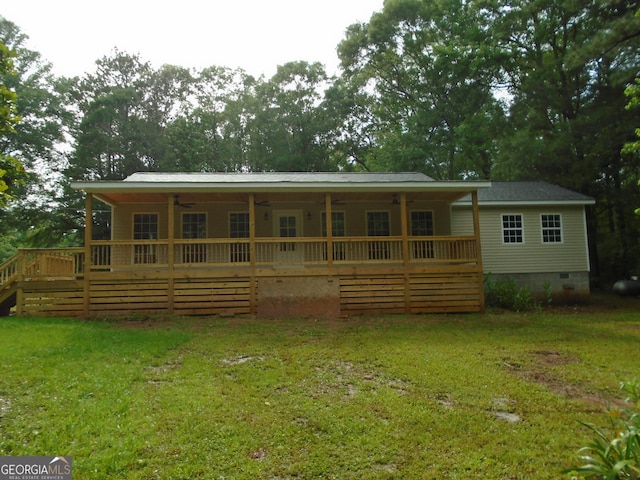 621 Zebulon Rd, Milner, GA 30257 - back of property with a yard, crawl space, ceiling fan, and a wooden deck