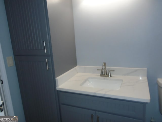 621 Zebulon Rd, Milner, GA 30257 - bathroom with vanity and toilet