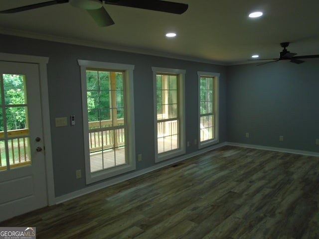 621 Zebulon Rd, Milner, GA 30257 - doorway to outside with a ceiling fan, ornamental molding, dark wood finished floors, recessed lighting, and healthy amount of natural light