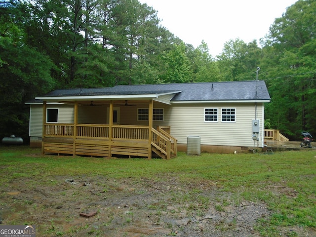621 Zebulon Rd, Milner, GA 30257 - back of house featuring ceiling fan, crawl space, a deck, and roof with shingles