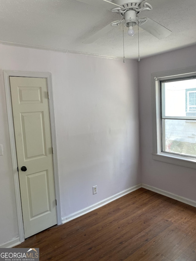 525 Ormond Ter, Macon, GA 31206 - unfurnished room with a ceiling fan, wood finished floors, baseboards, and a textured ceiling