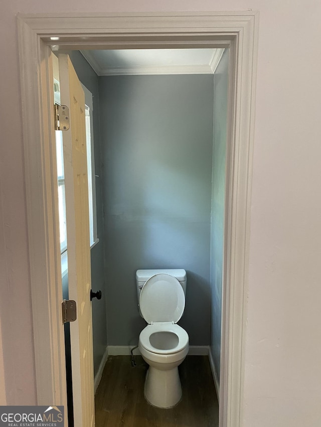 525 Ormond Ter, Macon, GA 31206 - bathroom featuring baseboards, wood finished floors, ornamental molding, and toilet