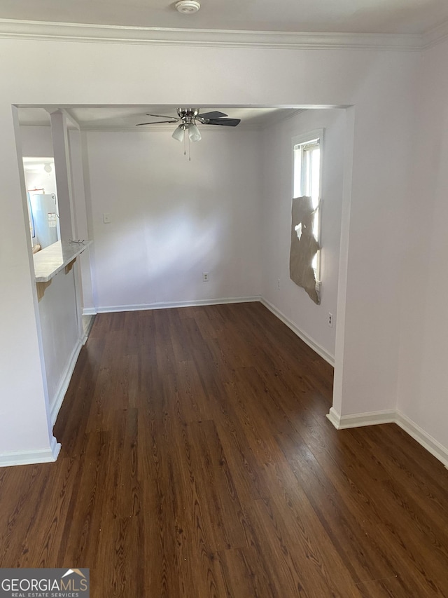 525 Ormond Ter, Macon, GA 31206 - spare room with a ceiling fan, dark wood-type flooring, baseboards, crown molding, and a smoke detector