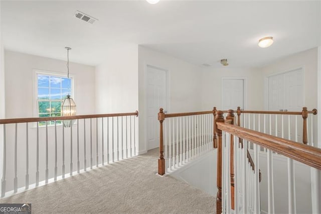 606 Hay Meadow Pl, Acworth, GA 30102 - corridor with an upstairs landing and carpet