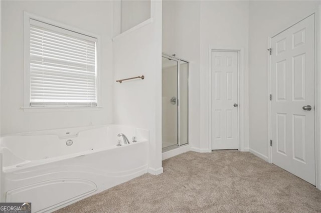 606 Hay Meadow Pl, Acworth, GA 30102 - full bathroom featuring carpet flooring, a shower stall, and a garden tub