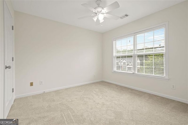 606 Hay Meadow Pl, Acworth, GA 30102 - spare room with light carpet, baseboards, and a ceiling fan